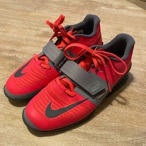 Hot pink Nike Romaleos lifting shoes
